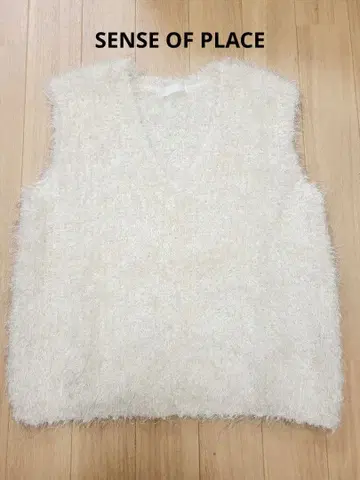 SENSE OF PLACE 몰 페더 니트 베스트 아이보리 가격 인하