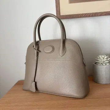 abientot 베이지 가죽 핸드백