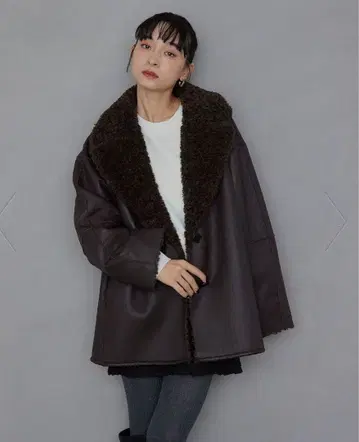 EM 리버서블 페이크 무스탕 코트