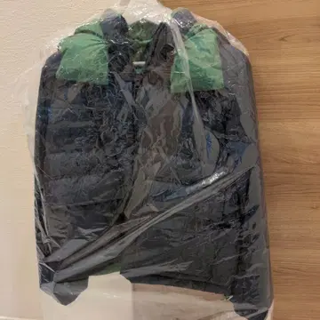 유니클로 jwAnderson 콜라보 다운