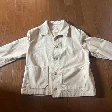 유니클로 베이지 커버올 버튼 포함