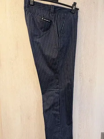 and per se 네이비 스트라이프 팬츠