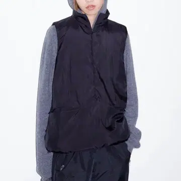 1990s DKNY zip padded pullover vest