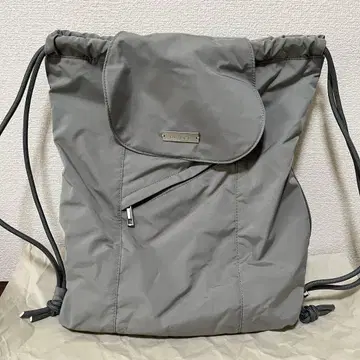 un/neu 그레이 나일론 드로우 스트링 백팩