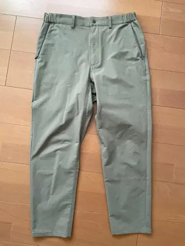 NEW BALANCE MET24 SLIM TAPERED FIT 팬츠 카키