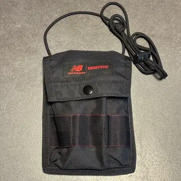 뉴발란스 브리핑 블랙 사코슈