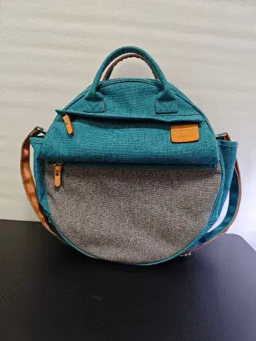 하트메이드팩토리 터콰이즈 컬러 원형 백 MARU