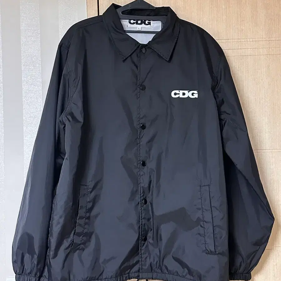 Black CDG Coach Jacket | Comme Des Garçons Jacket - Jackets