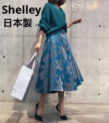 sheller 셰리에 플로키 프린트 스커트 그린 비대칭