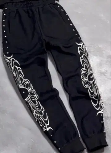 JANPARI 꽃무늬 조거 팬츠 블랙