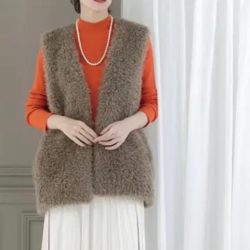 OPAQUE.CLIP 컬리 인조 모피 베스트 모카 브라운