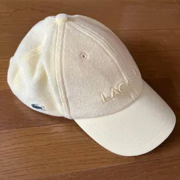 LACOSTE 크림색 캡