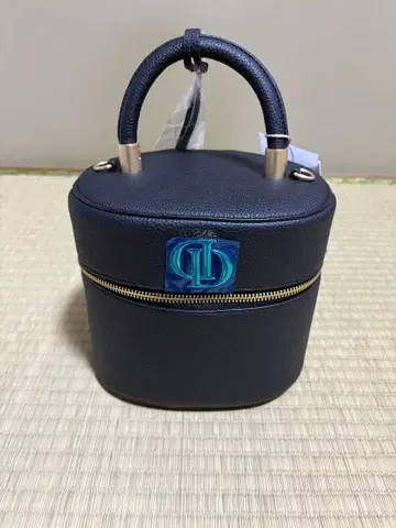 네이비 라운드형 숄더백