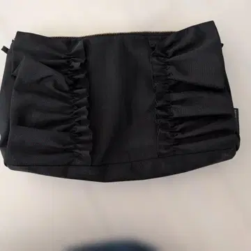 SURFINIA 블랙 프릴 파우치
