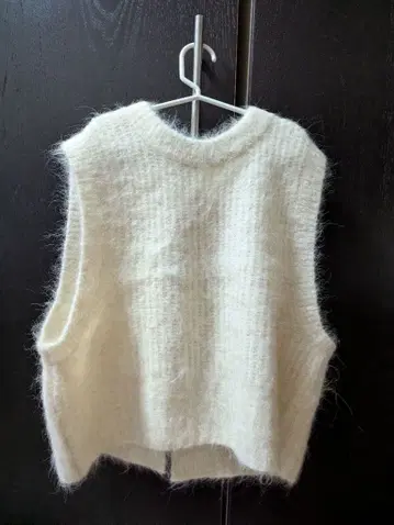 그린 라벨 릴랙싱 화이트 슬리브리스 베스트