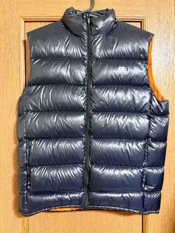 다운 베스트 네이비 슬리브리스