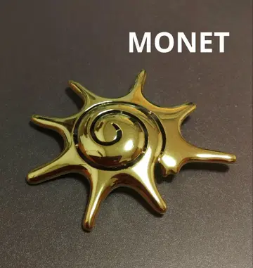 MONET 골드 태양형 브로치