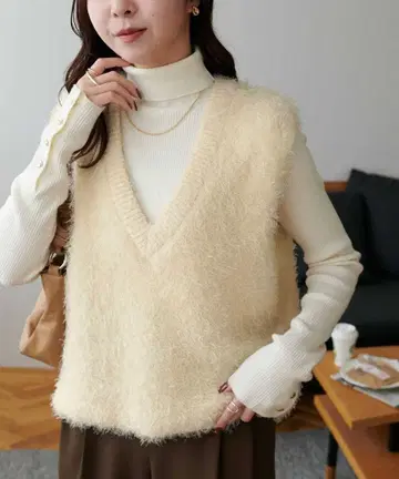 디스코트 페더얀 니트 베스트 아이보리