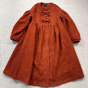 UNOSA 24AW 울 플레어 롱 코트 리본 볼륨 슬리브