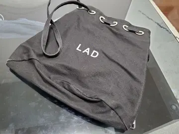LAD MUSICIAN DRAWSTRING BAG