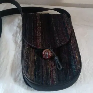 찢어 짜는 숄더백