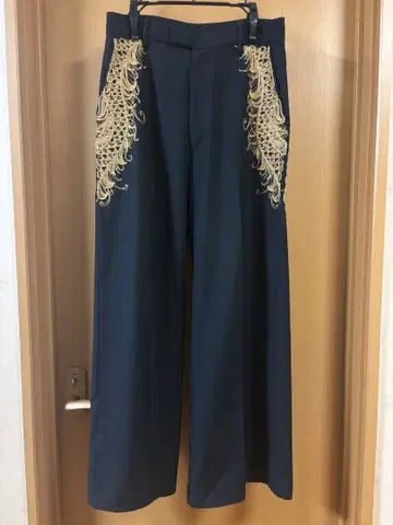 Christian dada embroidery wide slacks 44