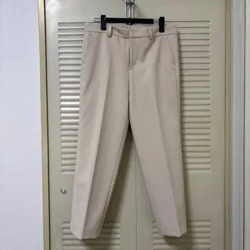 쿠 드 샹스 밝은 베이지 테이퍼드 팬츠 안감 있음