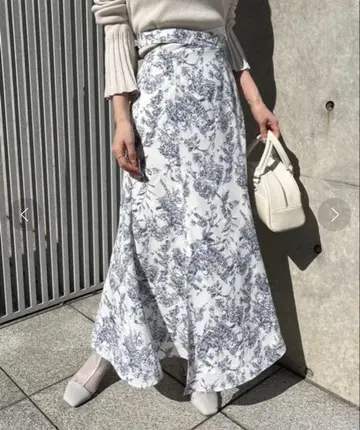 NICECLAUP 크로스 백리본 스커트