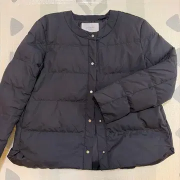 오페크 도트 클립 노카라 다운 재킷