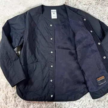 새상품급 오르치발 다크 네이비 사이즈 2 퀼팅 노카라 이너 자켓