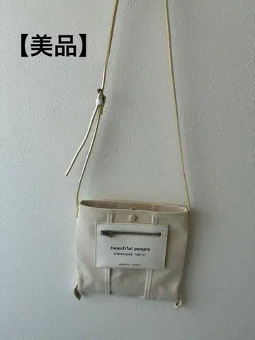 beautiful people 라이닝 로고 포켓 미니 숄더백