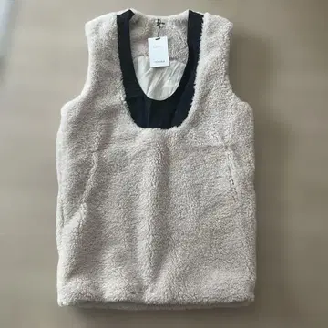 POCHER 베이지 플리스 슬리브리스 베스트