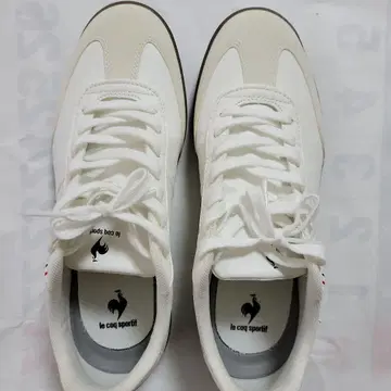 르꼬끄 스포르티브 화이트 스니커즈