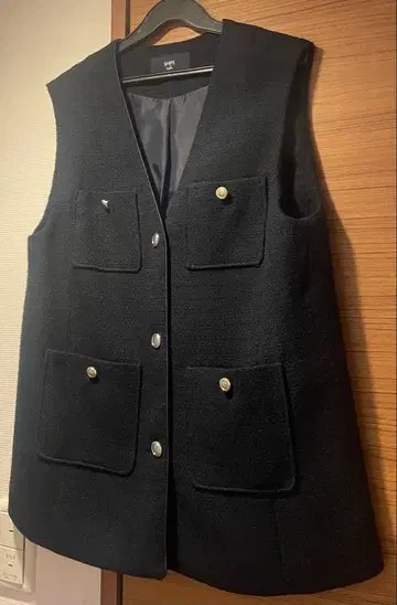 네이비 슬리브리스 베스트 포켓 부착