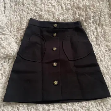 케이트 스페이드 하트형 포켓 블랙 타이트 사다리꼴 스커트