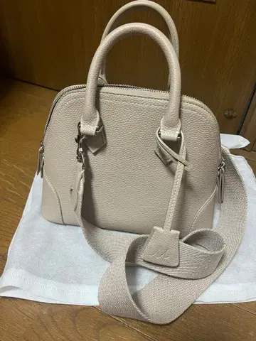 Mila Owen 와이드 숄더 보스턴 백 라이트 베이지