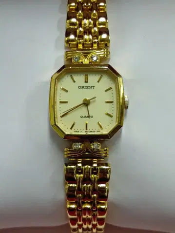 ORIENT 여성용 골드 쿼츠 손목시계 작동품