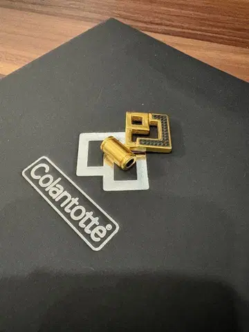 코란토츠테 탑만 TAO 목걸이