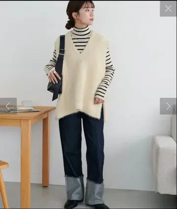 DISCOAT 페더 얀 튜닉 베스트 아이보리