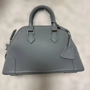 미라 오웬 와이드 숄더 보스턴 백 블루