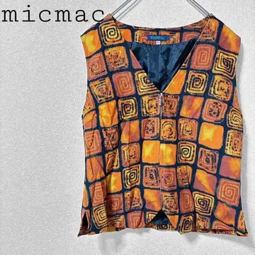 믹맥 슬리브리스 베스트 오렌지 계열 캐주얼 집업 올 패턴