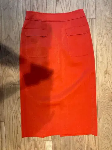 투모로우랜드 오렌지 타이트 스커트 앞 포켓 부착