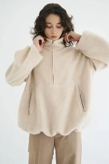 CLANE SLIVER 하프 집업 탑