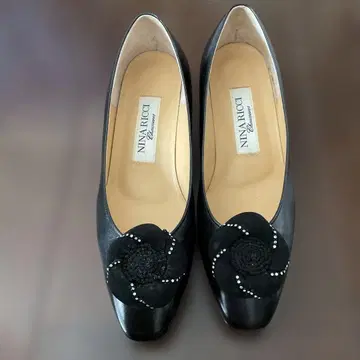 NINA RICCI 블랙 플라워 모티브 펌프스