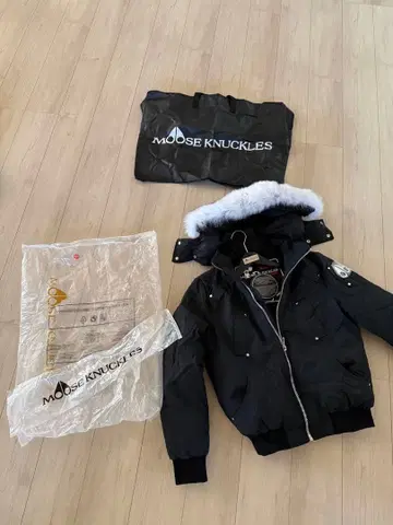 무스 너클스 블랙 다운 자켓