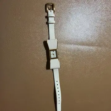 케이트 스페이드 리본형 핑크 베이지 손목시계