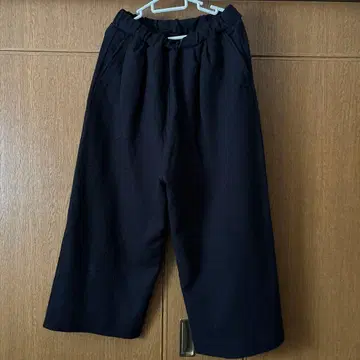 UNIVERSAL SEVEN 블랙 와이드 팬츠