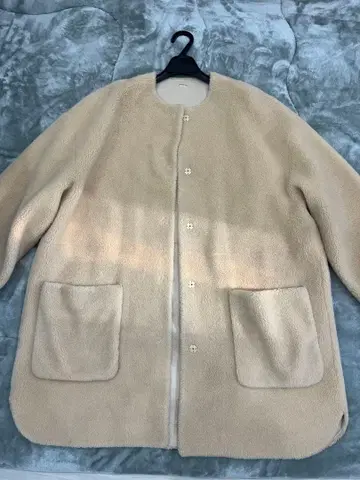 미라 오웬 노카라 무스탕 코트