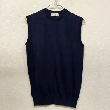 Limitless Luxury 슬리브리스 니트 네이비