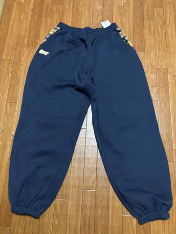 CENTIMETER 네이비 체크 스웨트 팬츠